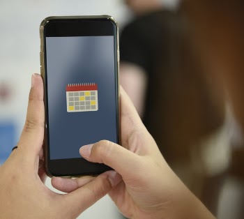 Photo of iPhone Showing Calendar Logo