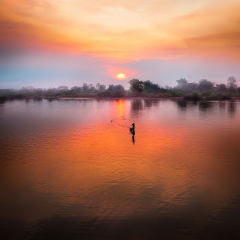 Photo of Lake During Sunseet