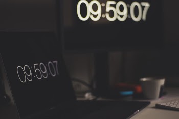 Photo of Laptop Displaying time