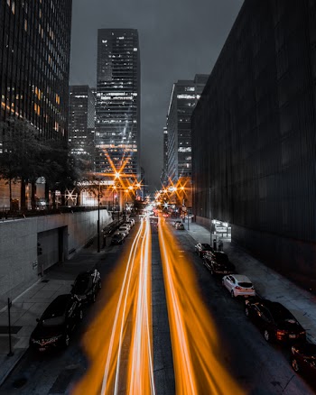 Photo of Light Streaks On Road During Evening