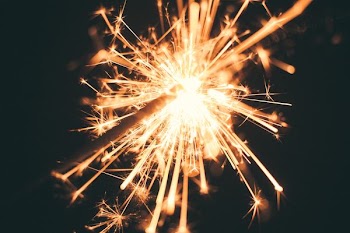 photo of lighted sparkler