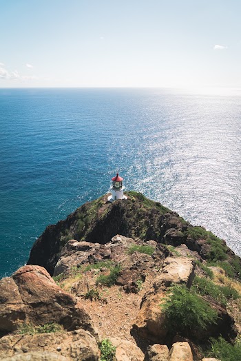 Photo Of Lighthouse Near Seashore