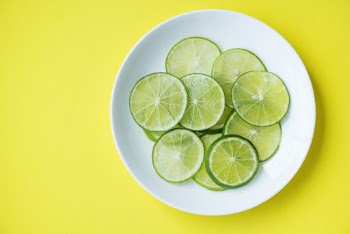 Photo of Lime Fruits on Saucer