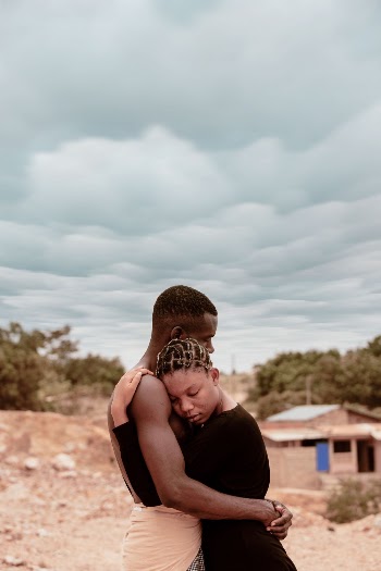 Photo of Man and Woman Hugging