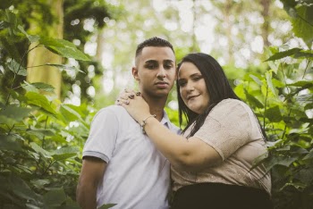 Photo of Man and Woman Outdoors