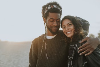 Photo Of Man And Woman Smiling