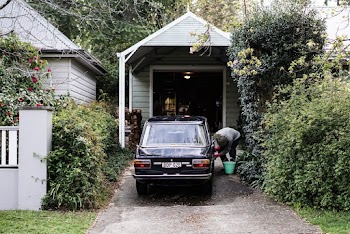 Photo Of Man Cleaning Car