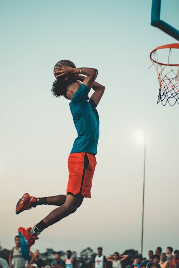 Photo Of Man Doing Dunk