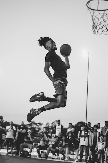 Photo Of Man Doing Dunk
