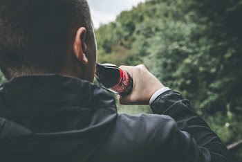 Photo of Man Drinking Coca-cola