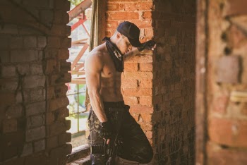 Photo of Man Holding A Rifle