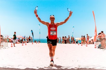 Photo Of Man Holding Bottles