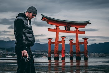 Photo of Man Holding Camera