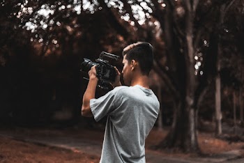 Photo Of Man Holding Camera
