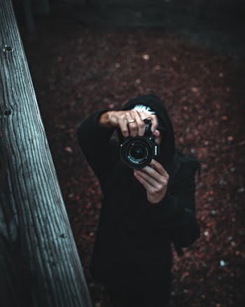 Photo Of Man Holding Camera