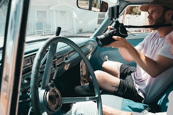 Photo Of Man Holding Camera