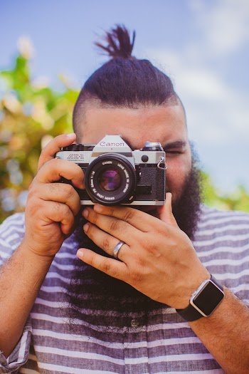 Photo Of Man Holding Camera