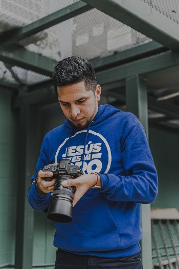 Photo of Man Holding Camera
