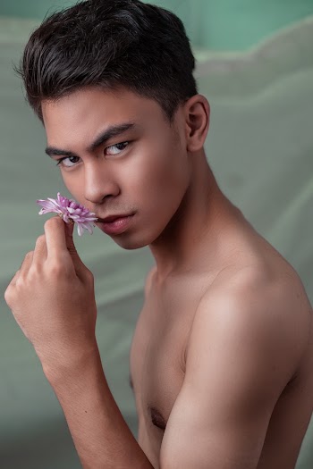 Photo Of Man Holding Flower