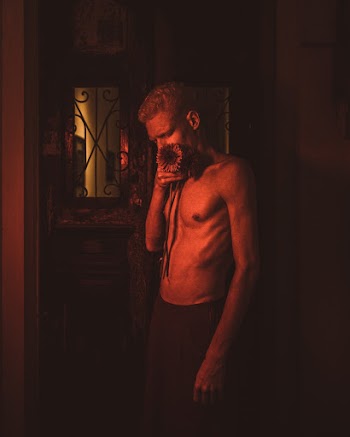 Photo Of Man Holding Flower