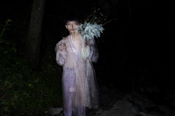 Photo Of Man Holding Flowers