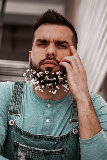 Photo Of Man Holding His Face