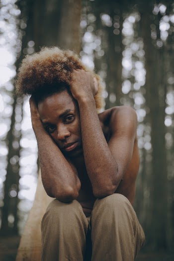 Photo of Man Holding His Hair