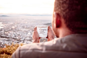 Photo of Man Holding Mug