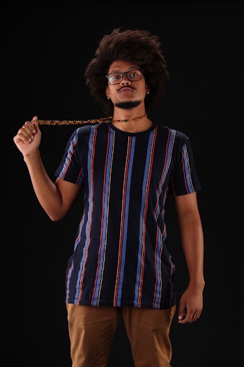 Photo Of Man Holding Necklace