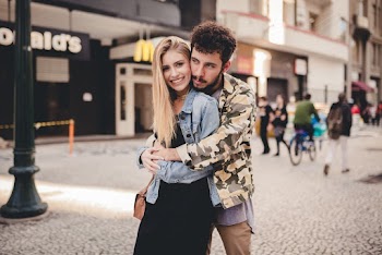 Photo of Man Hugging A Woman