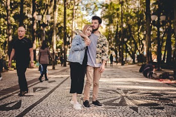 Photo of Man Hugging A Woman