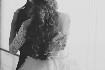 Photo Of Man Hugging Woman