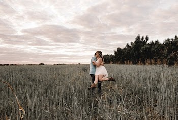 Photo Of Man Hugging Woman