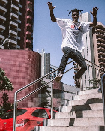 Photo of Man Jumping of Stairs