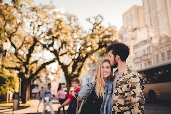 Photo of Man Kissing A Woman's Head