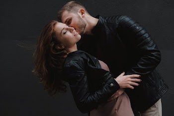 Photo Of Man Kissing Woman