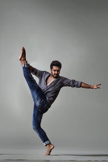 Photo of Man Lifting His Left Foot