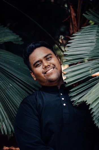 Photo Of Man Near Leaves