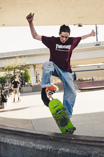 Photo Of Man Playing Skateboard
