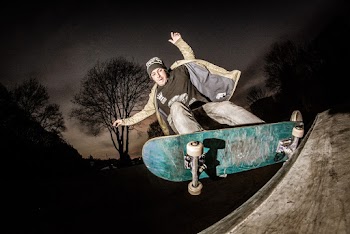 Photo Of Man Playing Skateboard