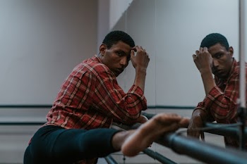 Photo Of Man Putting His Leg On Handrail 