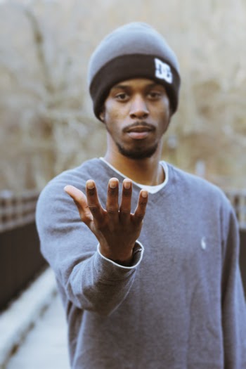 Photo of Man Raising His Right Hand