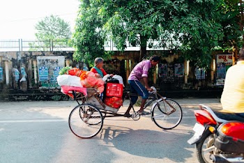 Photo Of Man Riding Bicycle