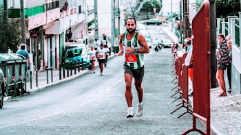 Photo of Man Running on Road