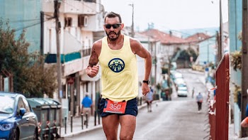 Photo of Man Running on Street