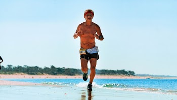 Photo Of Man Running On The Beach