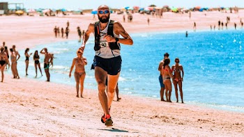 Photo Of Man Running On The Beach