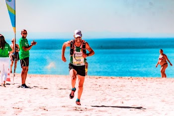 Photo Of Man Running On The Beach