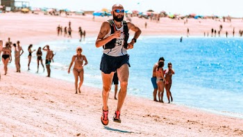 Photo Of Man Running On The Beach