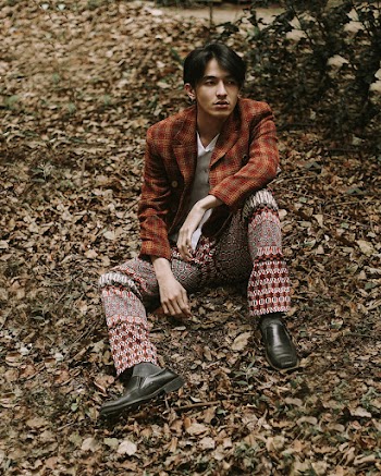 Photo of Man Sitting on Ground